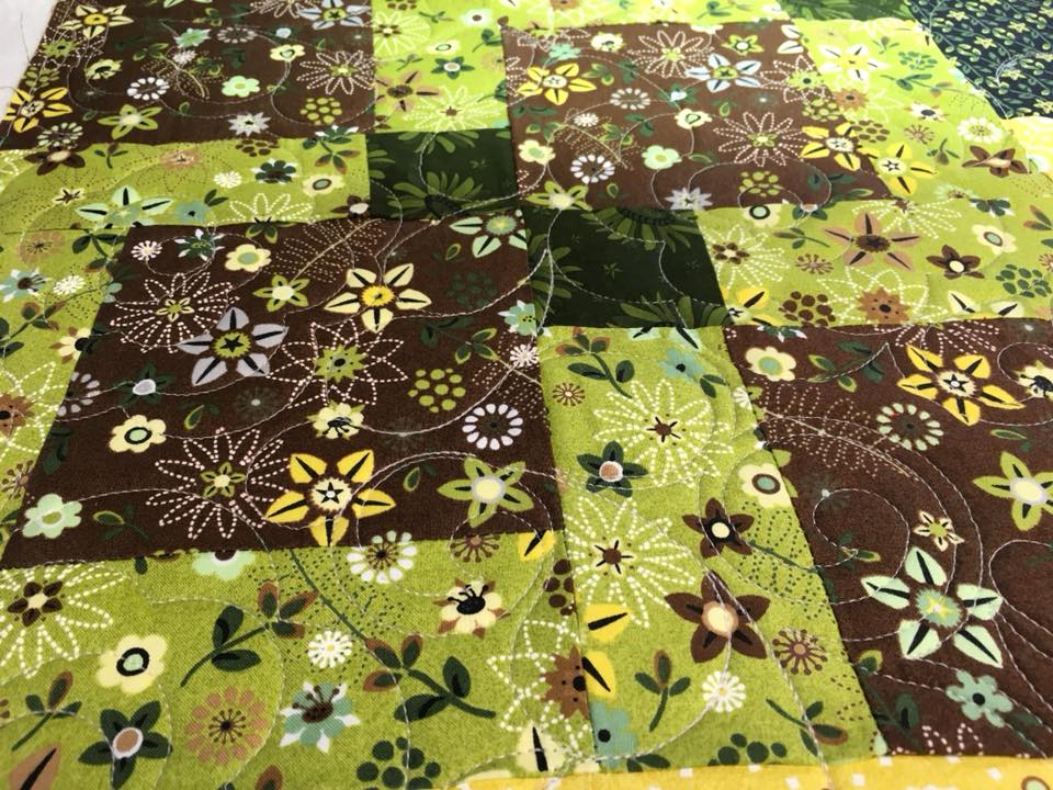 green floral square guilting close up